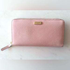 Pink zip up Kate spade wallet with credit card and coin slot
